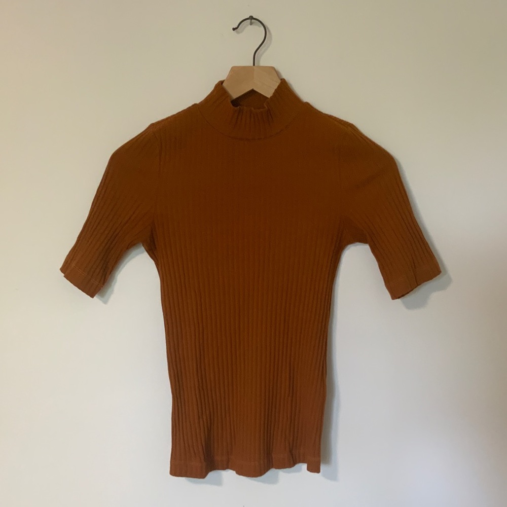 Orange mock-neck ribbed shirt